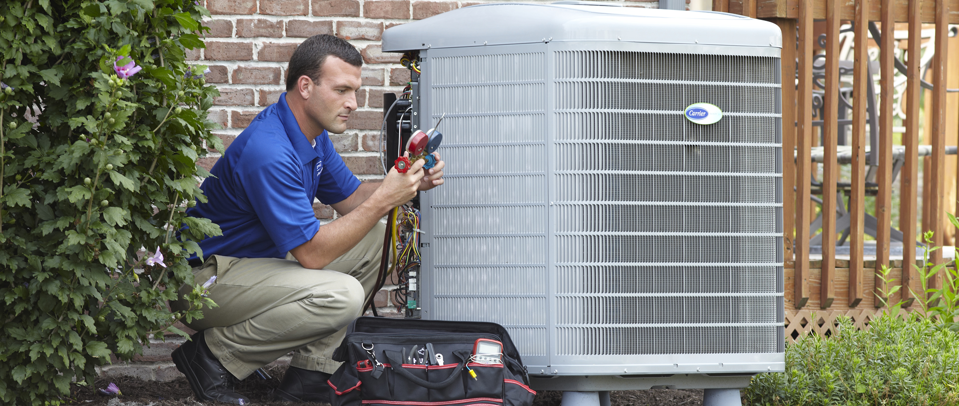 Service man completing a AC tune up service